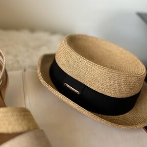 Stylish Tan Straw Hat with Black Band